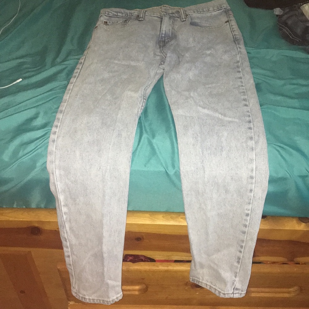 Washed light blue jeans